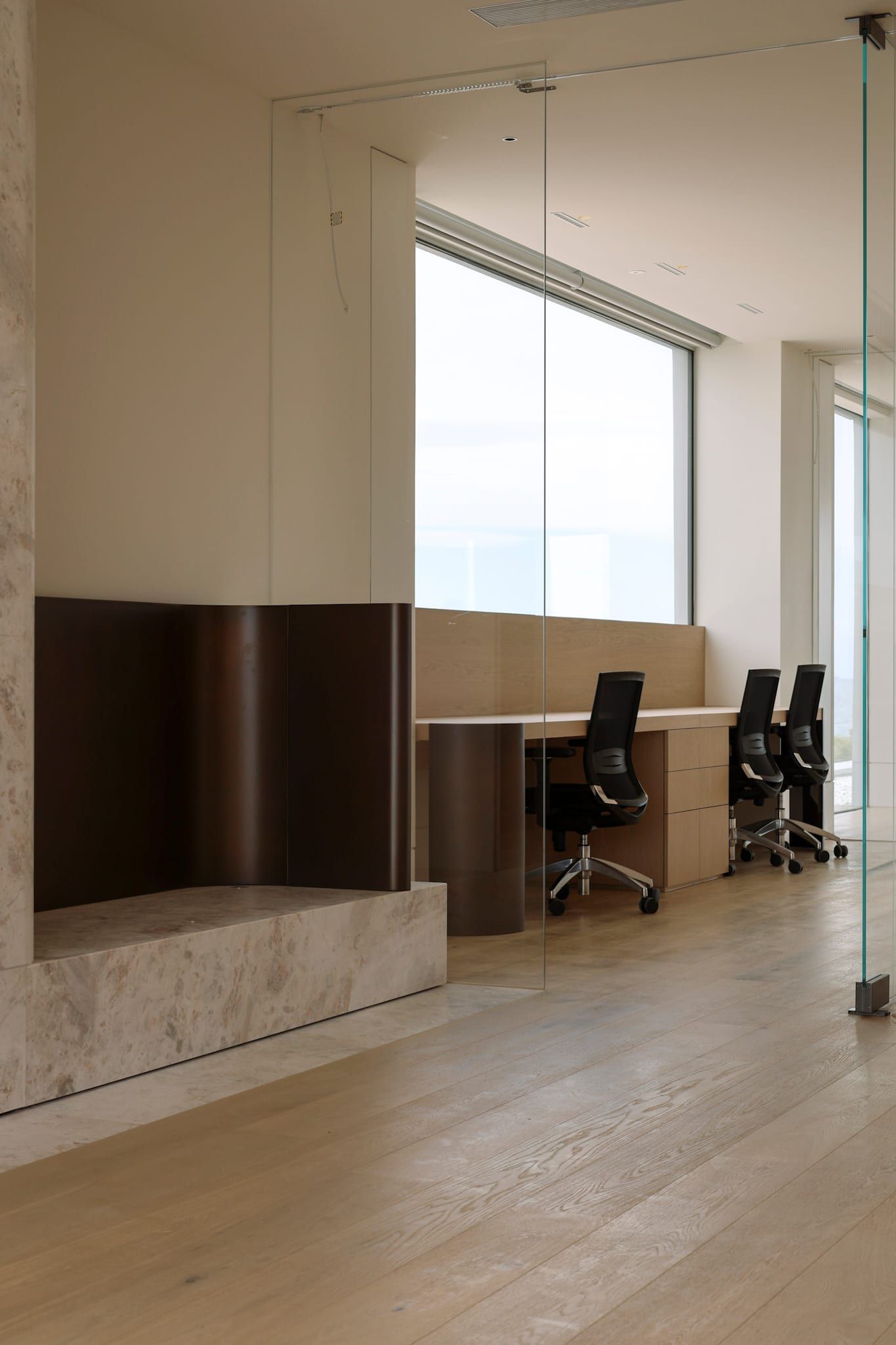 Glazed study at Arc House, the bay on the horizon beyond