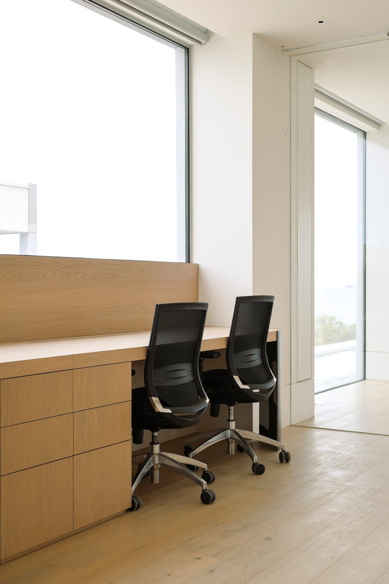 Living and study space with the bay beyond