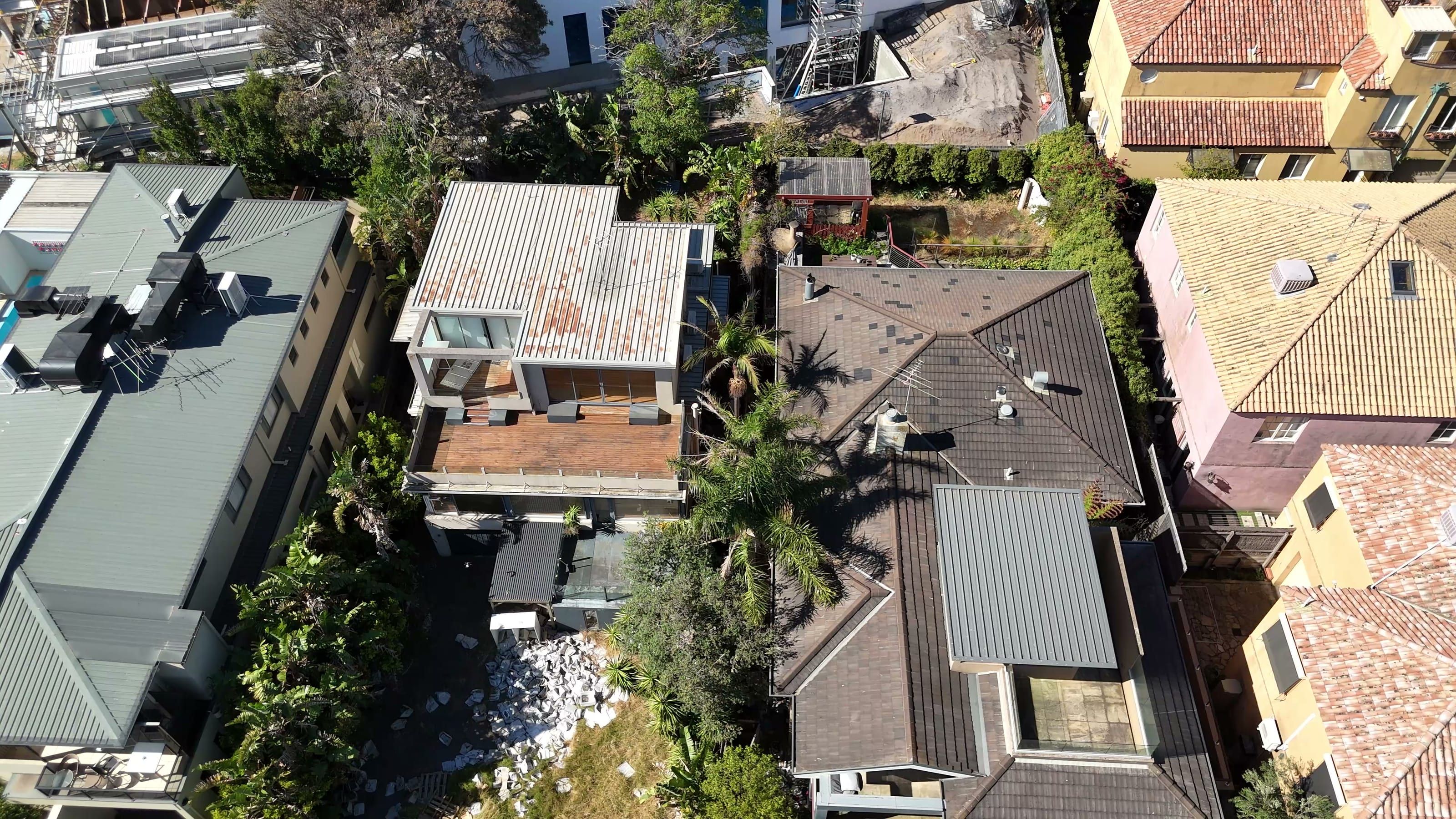 Aerial view of the original house on the Beach Road site before demolition