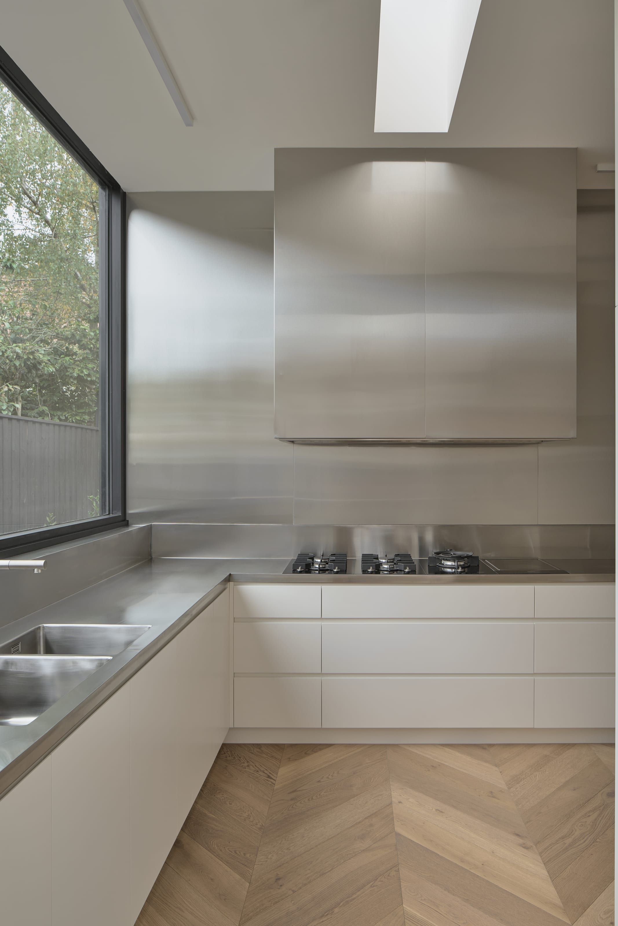 The kitchen bench against the garden window